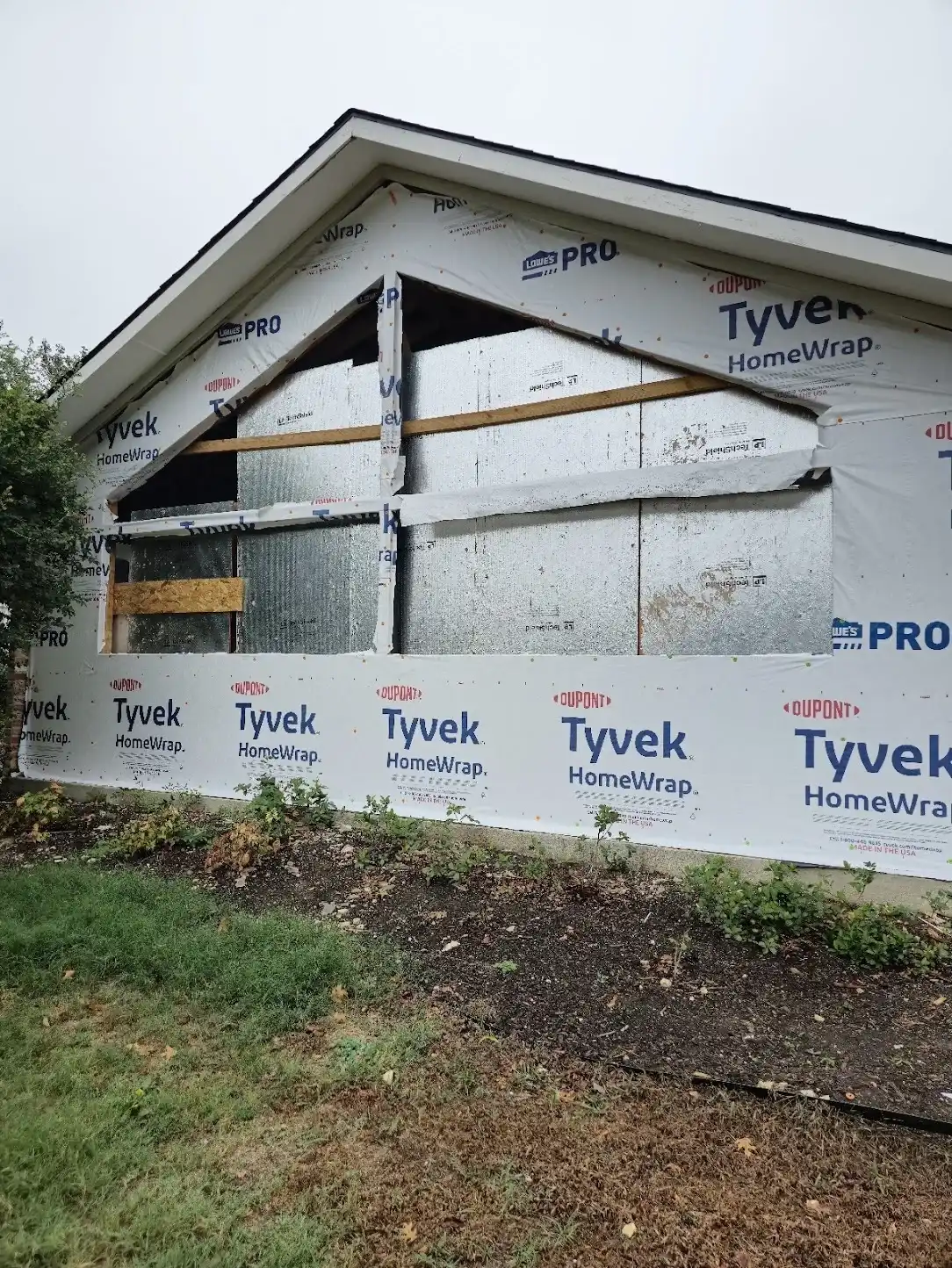 Gable rough openings before Anlin window installation in Plano